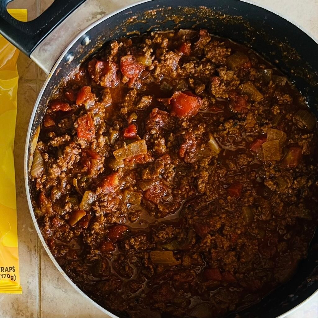A pot of fully cooked keto chili that is ready to eat or use in other fun recipes.