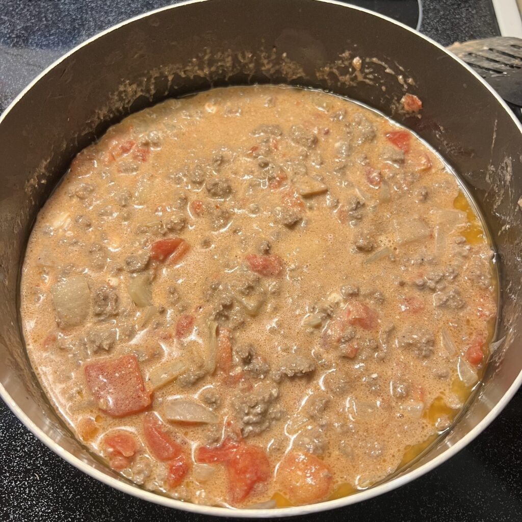 Delicious Keto cheeseburger soup cooking on the stove.