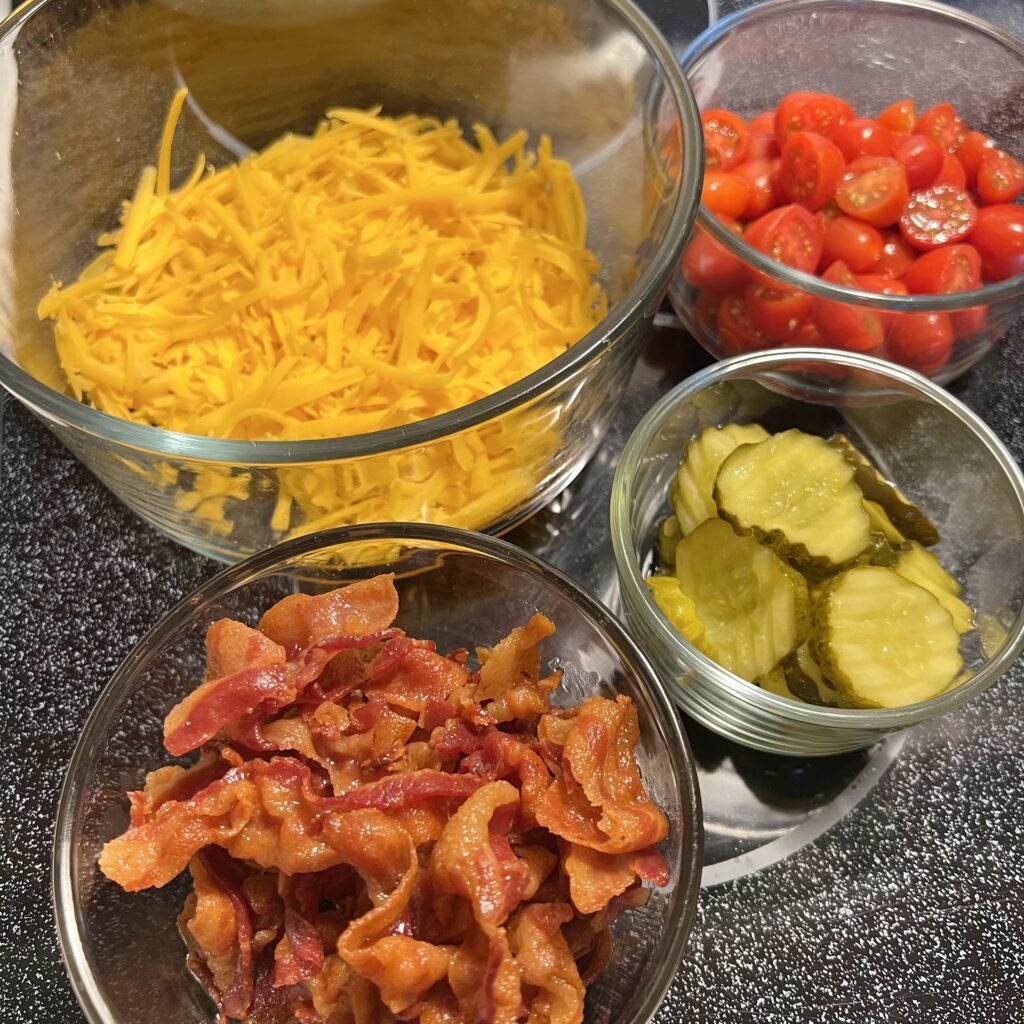 Loaded Keto cheeseburger soup toppings.