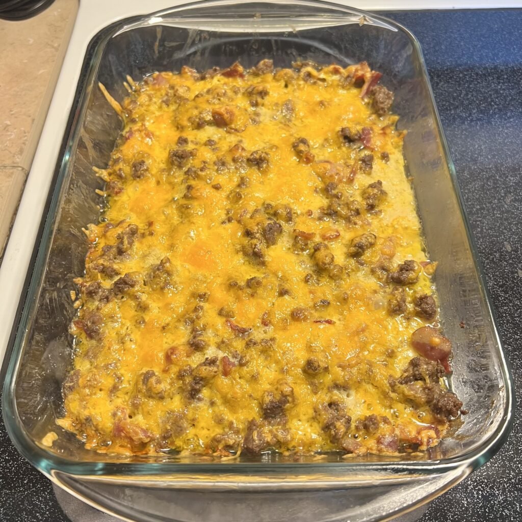 A yummy, sizzling cheesy carnivore casserole fresh out of the oven.