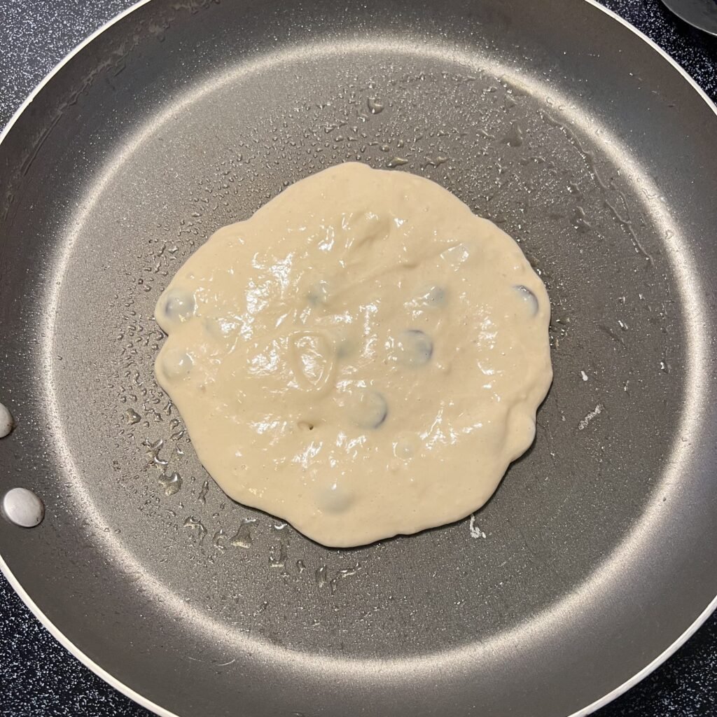 Chocolate chip sourdough pancake in a pan
