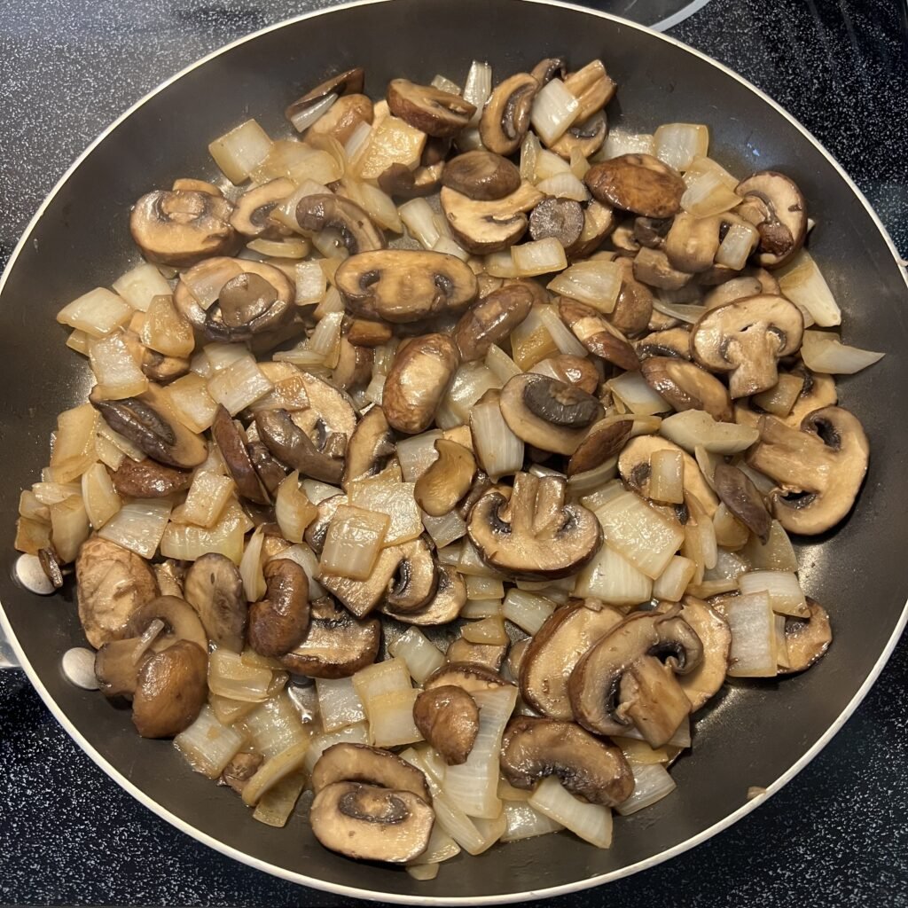 Delicious fried mushrooms and onions.