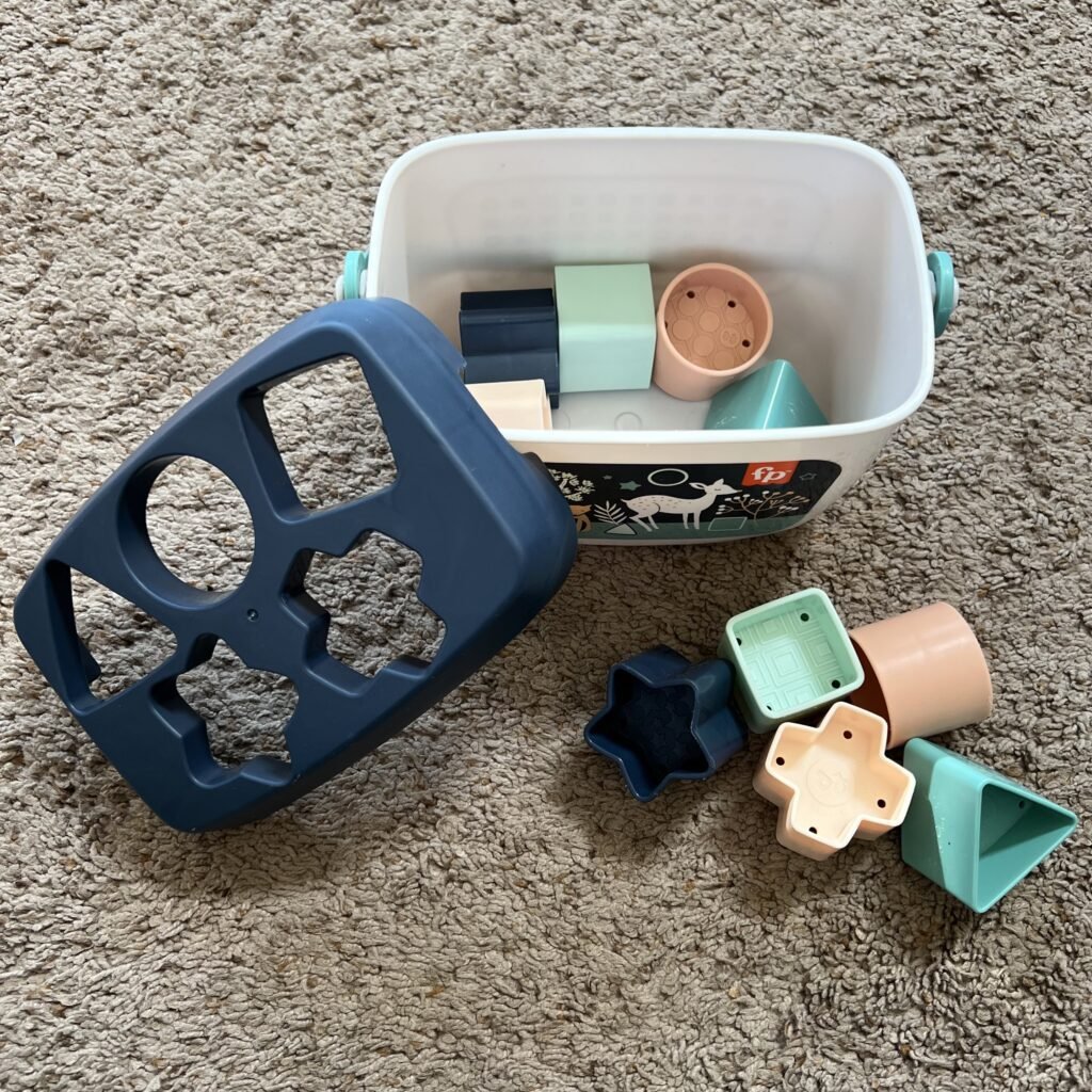 An overhead picture of Baby's First Blocks Set toy by Fisher Price. This is a fun learning toy for one-year-olds.