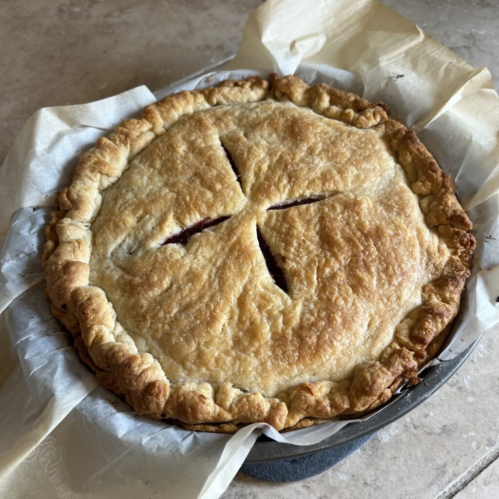 A yummy, fresh-baked, sweet cherry pie made with a delicious sourdough pie crust.