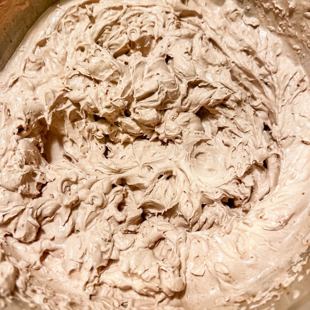 A large batch of freshly whipped chocolate mousse.