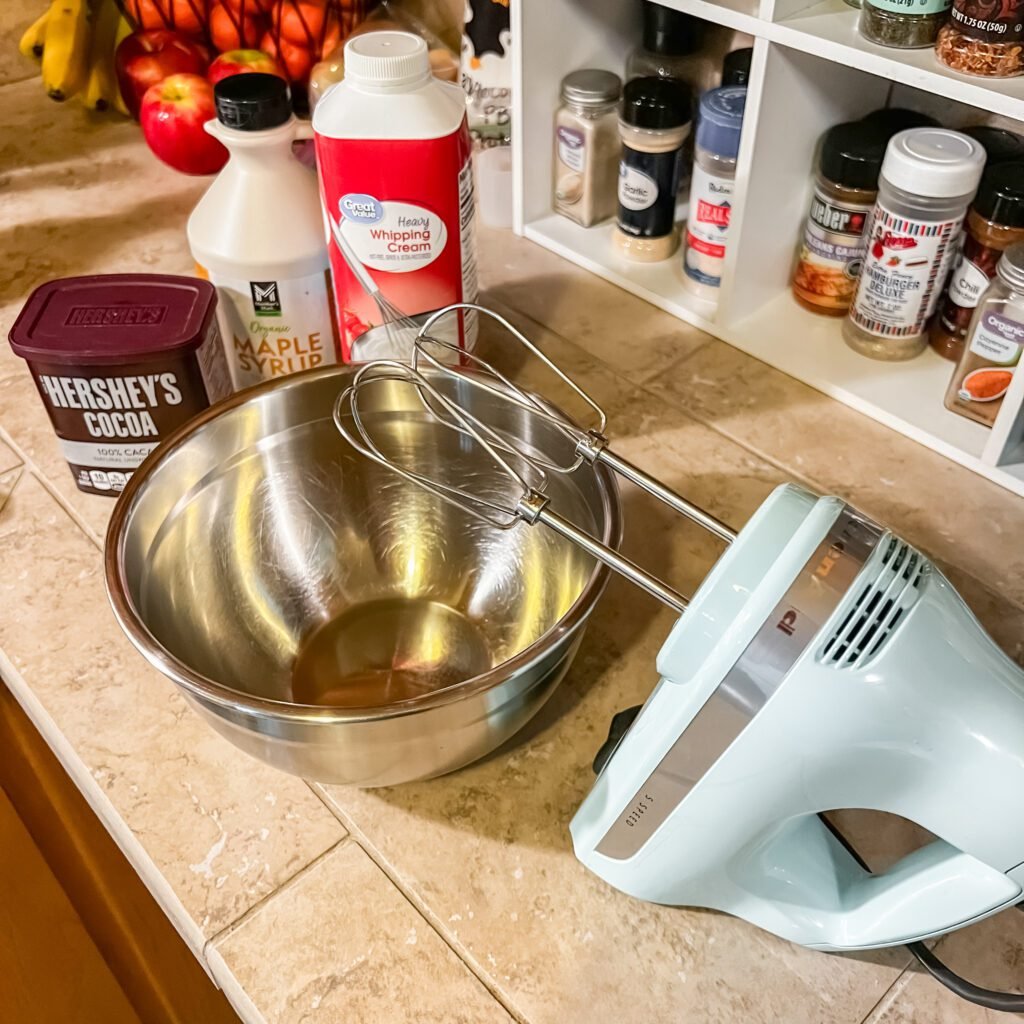 Ingredients and equipment needed to make an easy 3-ingredient chocolate mousse.