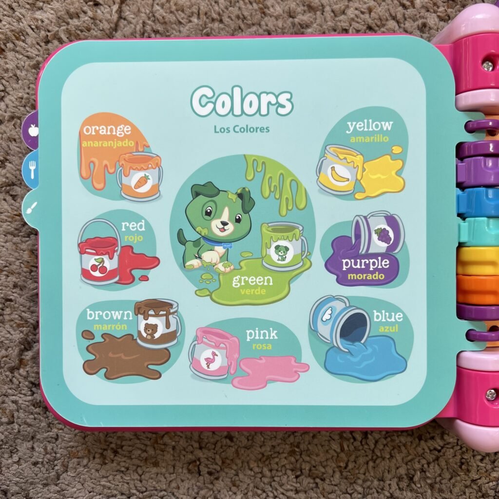 A close-up picture of the Colors page of the interactive Leap Frog Scout & Violet 100 Words Book learning book for toddlers.