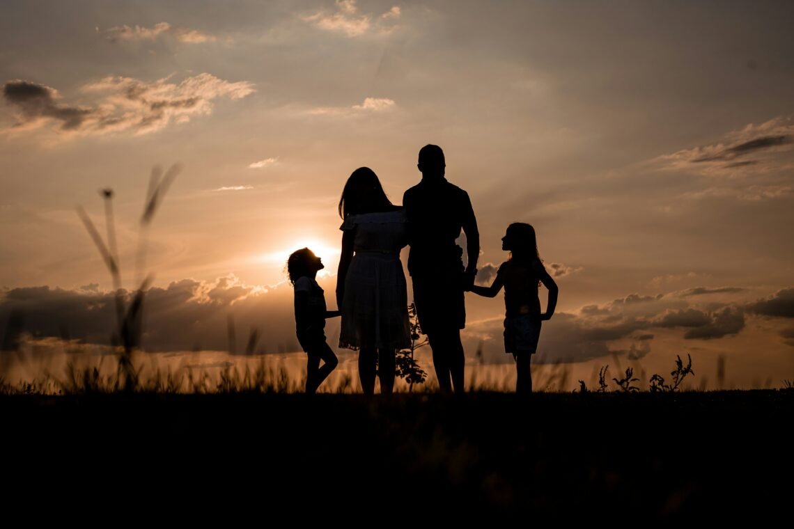 A strong family with a father, mother, and children. Christian moms fight for truth.