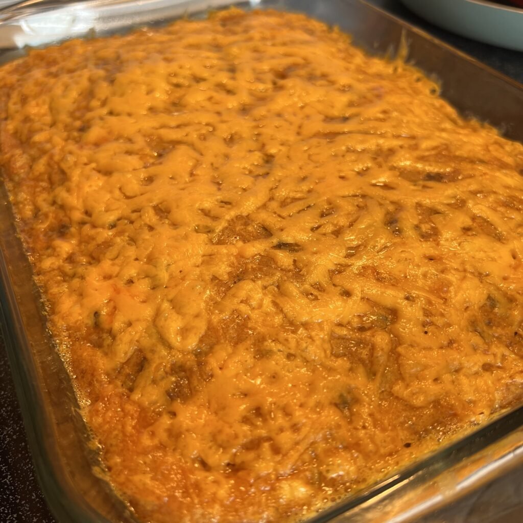 A close-up shot of a baked easy keto taco casserole. A family-friendly and kid-friendly delicious dinner!