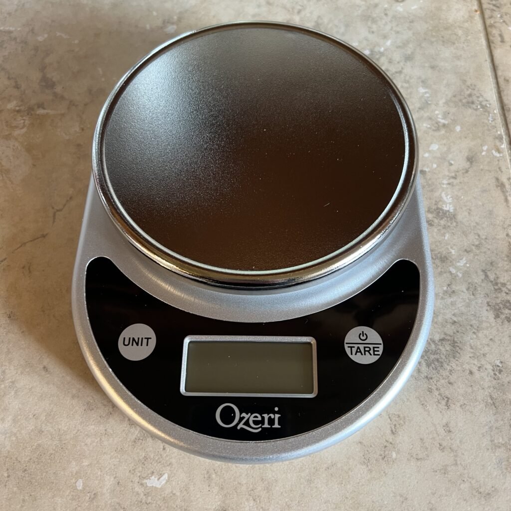 An Ozeri food scale. This is a handy kitchen tool and a must-have if you do anything with sourdough.