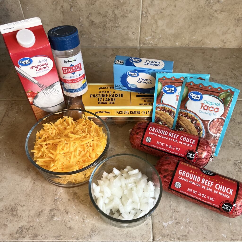 An overhead shot of the ingredients you need to make an easy keto taco casserole laid out on the kitchen counter ready to cook.