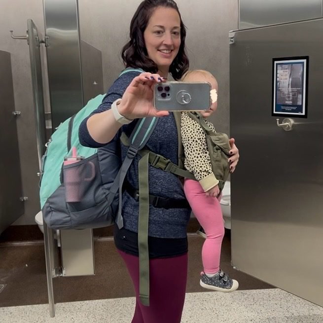 Hands-free strategy for going through the airport while flying solo with a toddler.