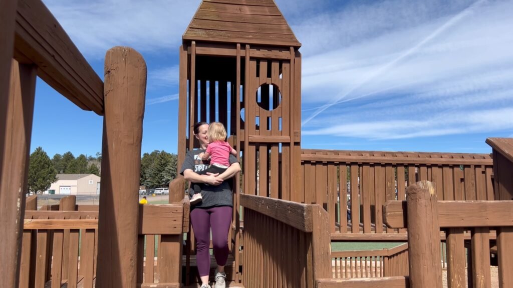 A mommy and toddler playing at the park, a way to find rest for tired moms.